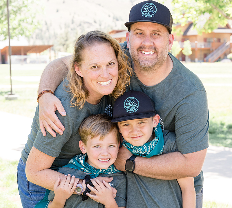Jen Christenson with her husband Blaine and sons Emery and Owen at flok Family Camp West.