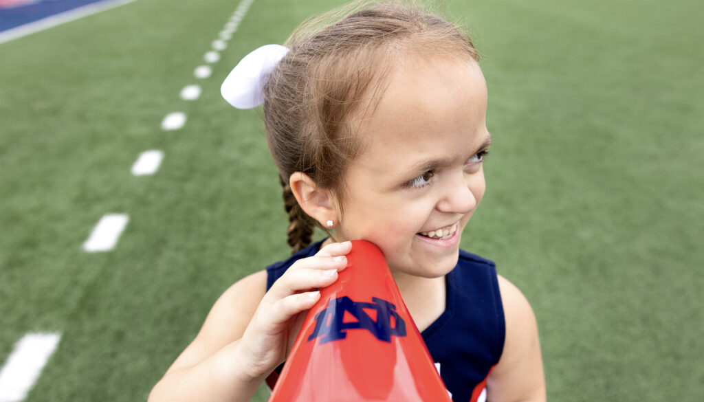 KK in her cheerleading outfit