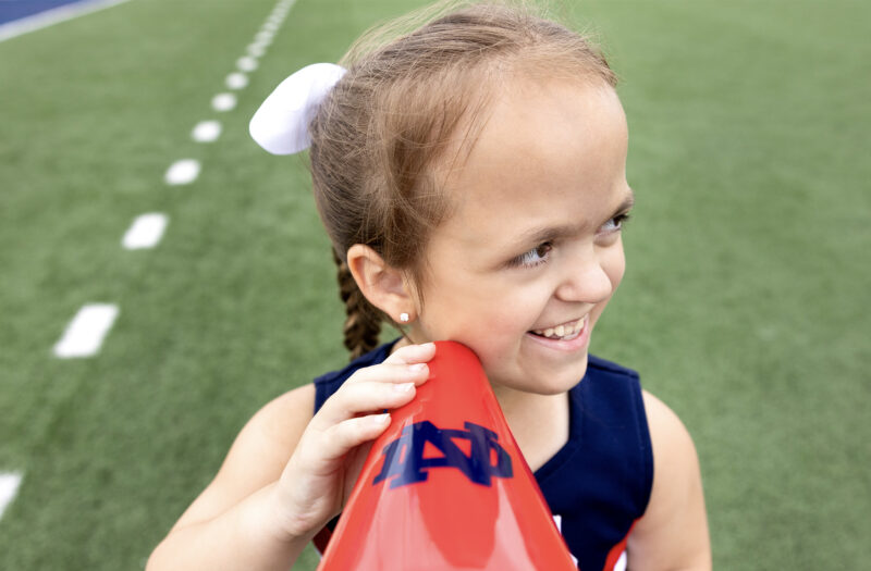 KK in her cheerleading outfit