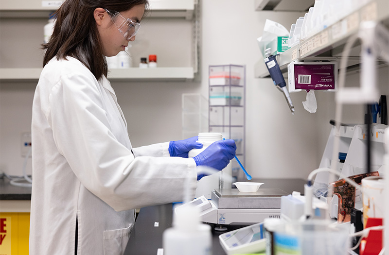 Employee working in lab.